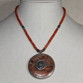 Volcanic Round Stone with old Roman Coin