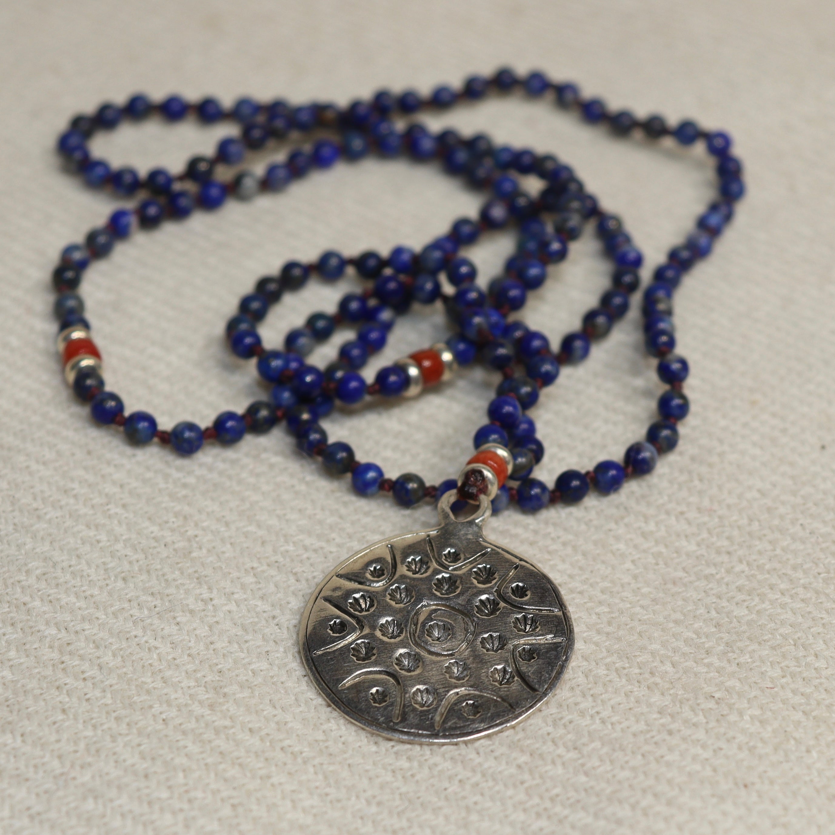 Silver Medal on a Lapis Chain